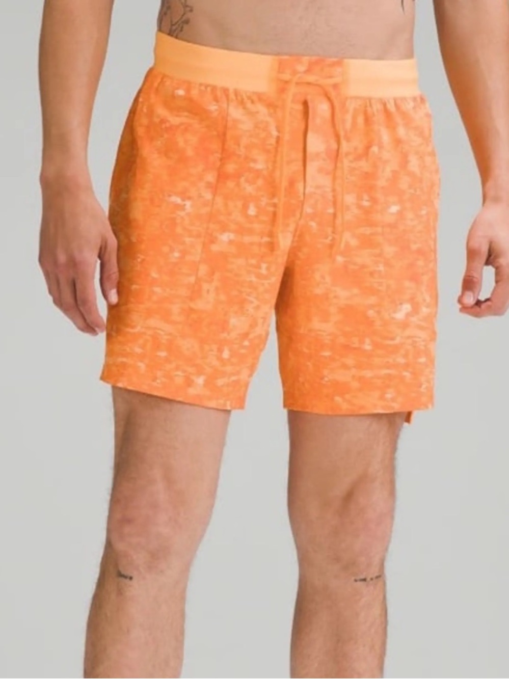 Lululemon License to Train 7" Linerless shorts, orange camouflage EUC Size XL